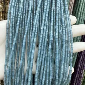 Detailed view of 2x2mm blue cylindrical natural stone beads for jewelry making