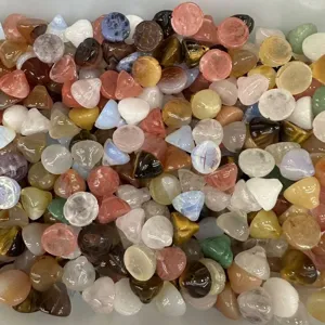 Detailed view of mixed 12mm natural stone lotus pod beads for DIY crafts