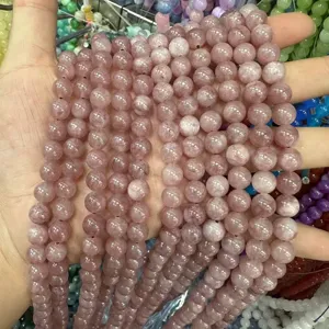 Detailed view of 8mm pink strawberry crystal round beads for DIY jewelry making