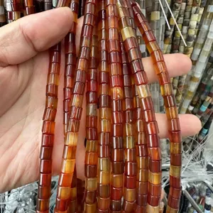 Close-up of natural red agate tube beads for DIY jewelry making
