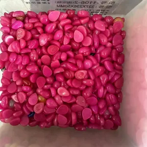 Macro view of magenta teardrop agate stone cabochons for DIY jewelry accessories