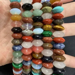 Detailed macro view of assorted saucer-shaped natural stone beads for DIY jewelry making accessories