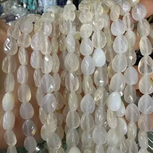 Close-up detail of natural white agate faceted waterdrop beads for jewelry DIY projects