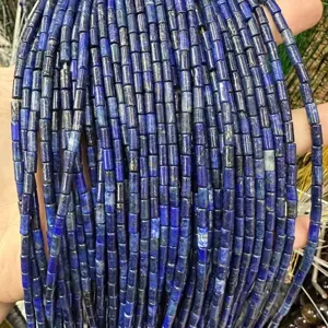 Macro detail of 3x6mm blue lapis lazuli cylinder stone beads for jewelry making