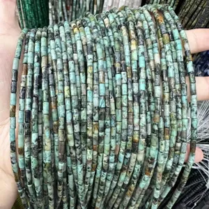 Macro detail of 3x6mm cylindrical natural stone tube beads for DIY necklace bracelets