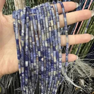 Close-up detail of 3x6mm blue-veined natural stone tube beads for DIY jewelry making
