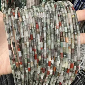 Macro view showing detail of 3x6mm cylindrical natural stone beads in mixed colors