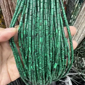 Detailed view of 3x6mm green malachite texture natural stone tube beads for DIY jewelry