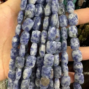 Close-up of blue and white natural stone rectangular faceted loose beads for DIY jewelry making