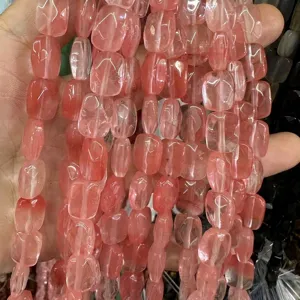 Macro view of faceted pink natural stone rectangle beads for DIY jewelry making