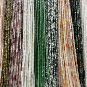 Detailed view of assorted 5x12mm bamboo-shaped natural stone tube beads for DIY jewelry