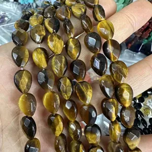Close-up detail of faceted tiger eye drop beads for natural stone DIY jewelry design