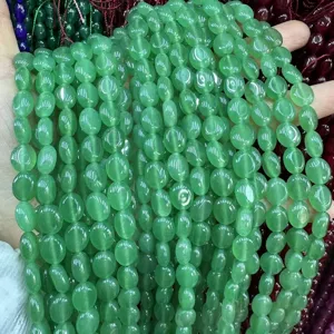 Vue détaillée des perles ovales en calcédoine verte 8*10mm pour la création bijoux