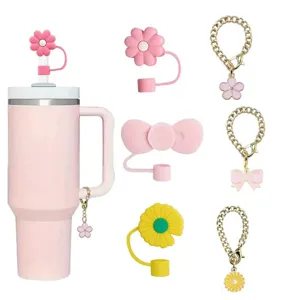Cute daisy bow straw covers and chain charms set for large tumblers, pink cup detail view.