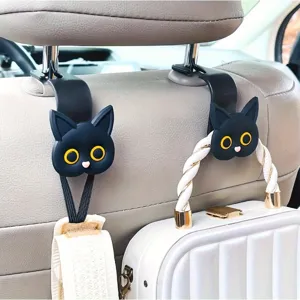 Cute black cat car seat back hook, universal vehicle headrest organizer, convenient storage bag hanger.