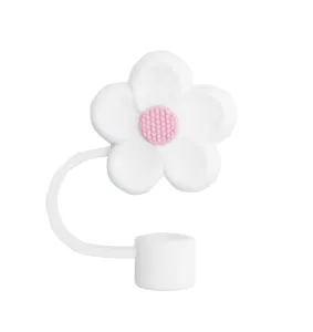 Silicone straw cover detail shot, featuring a cute white flower with pink textured center.