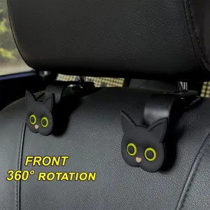 Detail shot of cute black cat car seat hook featuring 360 degree rotation for headrest use.