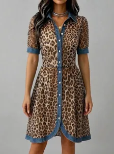 Leopard print midi dress featuring stylish denim contrast collar, placket, and cuffs.