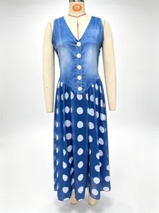 Detail view of the blue denim-effect sleeveless bodice and polka dot chiffon long dress.