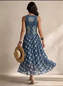 Back view detail of the stylish denim spliced polka dot long dress with elegant flowy skirt.