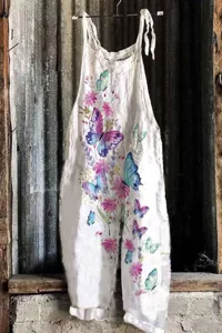 Women white cotton linen floral butterfly print sleeveless wide leg jumpsuit detail view.