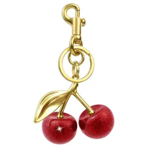 Elegante portachiavi con ciliegie glitterate rosse dorate e ciondolo per borsa da donna