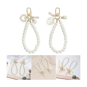 White pearl keychain cute heart shell pendant bag charm mobile phone strap accessory ring.