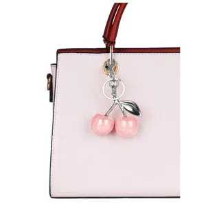 Cute pink cherry keychain detail, glitter bag pendant, sweet handbag accessory for women