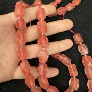Detail of faceted peach pink agate crystal octagonal beads for DIY jewelry making