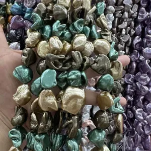 Détail de perles baroques irrégulières en forme de dent avec éclat métallique pour bijoux