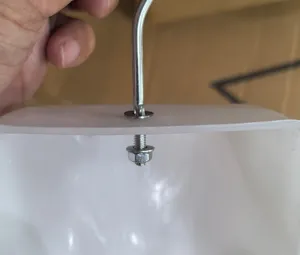Mannequin hook screw washer detail view for garment display fixture hardware accessory