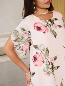 Élégante robe mi-longue manches courtes à imprimé floral pour femme, tissu confortable.