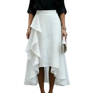 Elegant white high-low midi skirt featuring delicate floral embroidery and charming ruffle hem.