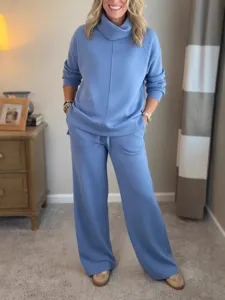 Elegant casual women's two-piece turtleneck sweatshirt and wide-leg pants outfit for autumn.