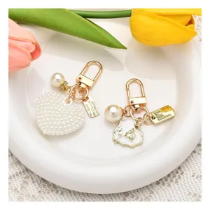 Pearl heart keychain cute metal bag charm elegant gold hardware fashion accessory for women