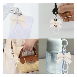 Portachiavi con fiocco di perle braccialetto estetico ciondolo per borsa accessorio 1pz