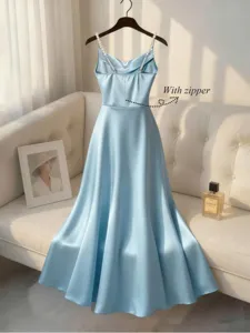 Elegant light blue satin slip maxi dress with beaded pearl straps and back zipper detail.