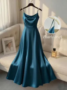 Elegant dark blue satin evening dress featuring delicate handmade pearl straps for women.