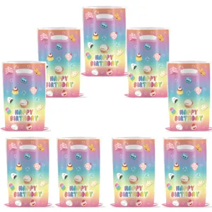 Detailed view of colorful rainbow party gift bags with cute cartoon food prints for birthday party.