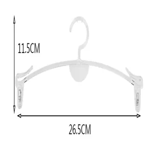 Gruccia in plastica trasparente per lingerie con mollette, espositore per reggiseni in negozio.