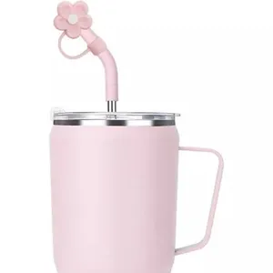 Pink stainless steel insulated tumbler with handle, lid and cute flower silicone straw cap.