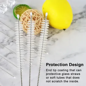 Stainless steel straw cleaning brush detail, protective end tip design for safe interior cleaning.