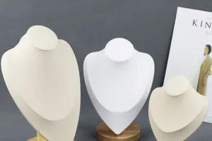 Necklace display stand jewelry bust with solid wood base for retail store counter showcase decor.