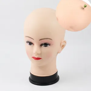 Plastic female mannequin head for wigs, hats and display, vinyl material with foam core.