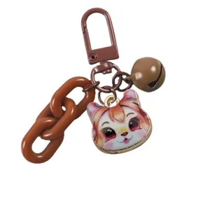 Cute cartoon cat keychain with brown acrylic chain and bell for bag charm accessory.