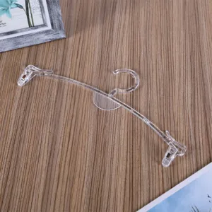 Gruccia trasparente in plastica per reggiseno con pinzette per esposizione negozio