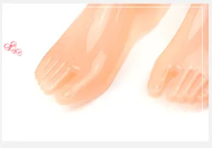 Plastic shoe display foot model detail showing hollow pink mannequin feet for retail stores.