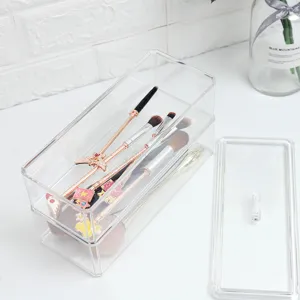 Clear acrylic makeup organizer with lid, multi-layer cosmetic storage box for desktop.