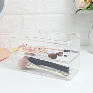 Transparent acrylic makeup organizer detail view showing multi-layer clear box interior.