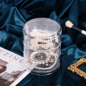 Clear multi-layer rotating round jewelry storage box desktop organizer for accessories.
